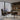 Stanley Furniture Horizon Mid-Century writing desk in warm wood finish styled in a modern home office with chair and decor, minimalist retro workspace furniture for small spaces.