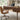 Stanley Furniture Horizon Mid-Century writing desk in warm wood finish styled in a modern home office with coastal artwork, task chair, and decor accents creating a clean contemporary workspace.