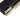 Arvon 71" TV Stand with Metal Legs in Black and Natural, angle view
