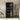 Everett Tall Glass Door Display Cabinet, in a room