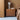 Stafford 3-Drawer Nightstand in Warm Brown Burl, in a room