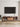 Garrison 85" Fluted TV Stand in Golden Brown, in a room